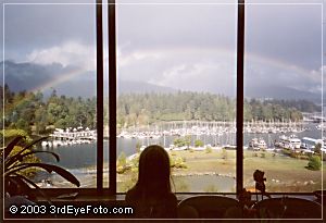 Kaelin looking out at a rainbow