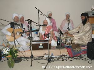 Snatam Kaur Khalsa and Guru Ganesha Singh Khalsa performing